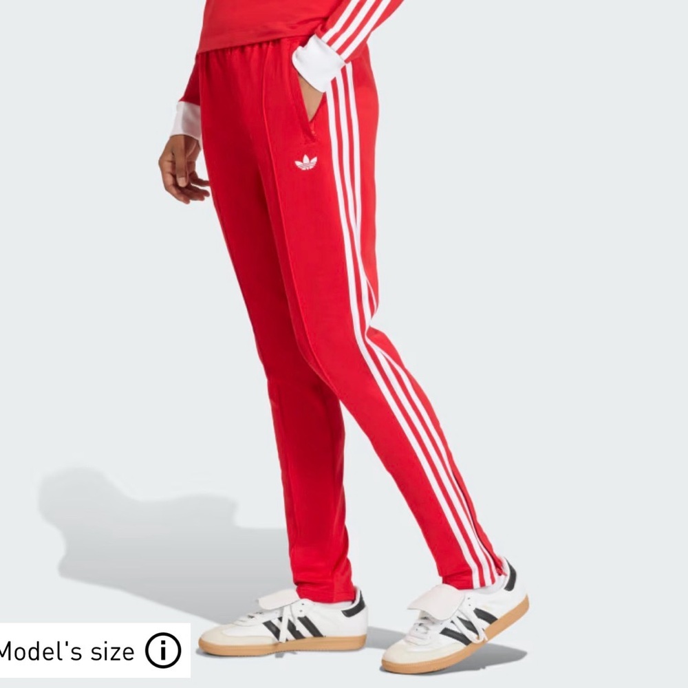 red Adidas Firebird or SST track pants with white stripes